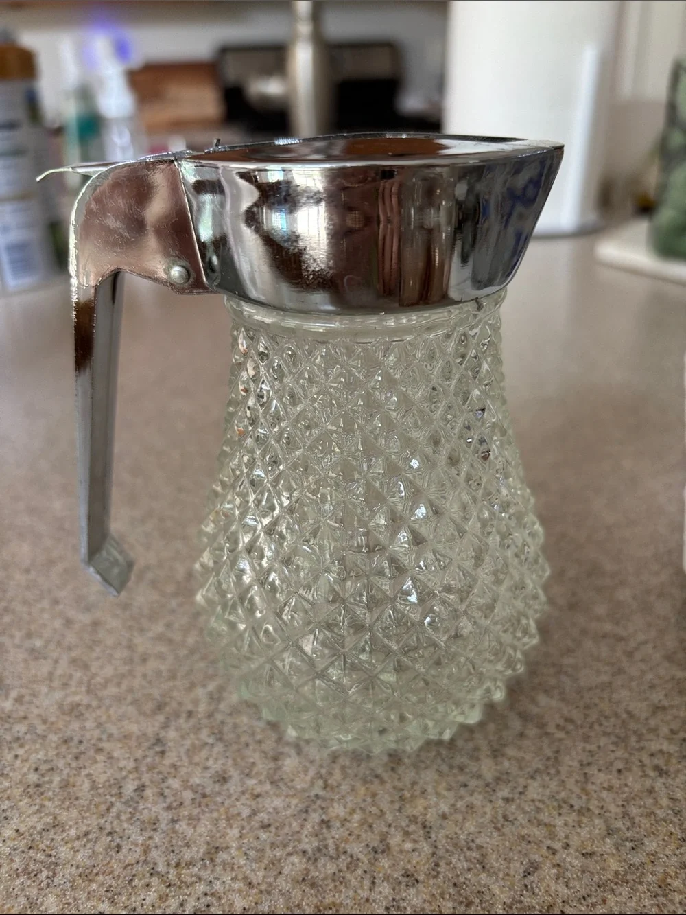 Clear Glass Honey Dispenser with Silver Metal Lid and Handle